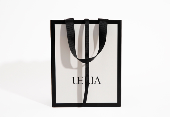 Custom Shopping Paper Bag Printed White Carry Bags Luxury Boutique Paper Bag For Clothes With Your Own Logo